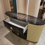 Curved Black and Cream Sideboard Cabinet with Three Central Drawers Textured Side Panels Gold Monogram Pulls and Rounded Profile